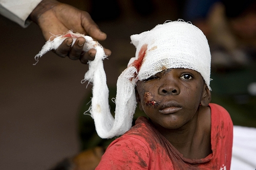 A Haitian boy receives treatment at an ad hoc medical clinic at MINUSTAH's logistics base.